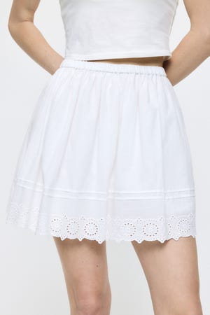 EYELET HEM FLARE MINI スカート
