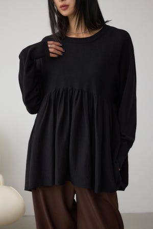 ペプラムデザインニットトップス