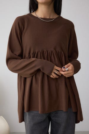 ペプラムデザインニットトップス