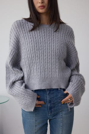 ドロストリングスパンコールラメニット