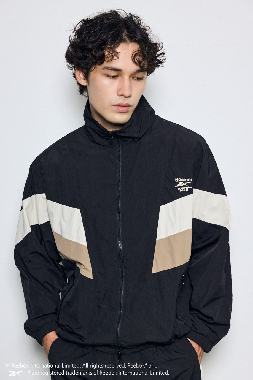 【REEBOK×AZUL】ナイロントラックジャケット BLK L