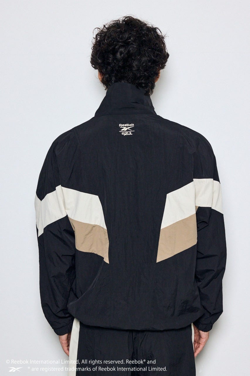 【REEBOK×AZUL】ナイロントラックジャケット BLK L