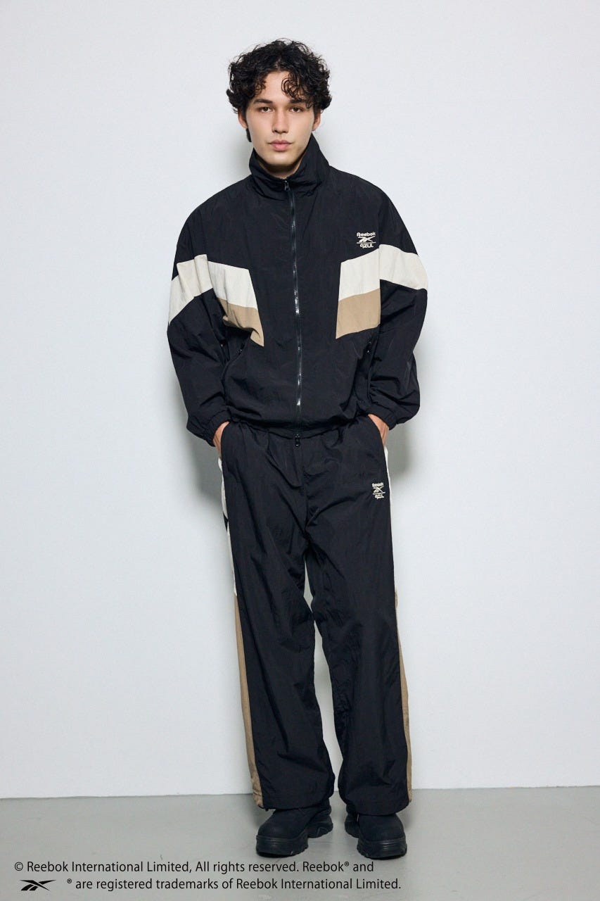 【REEBOK×AZUL】ナイロントラックジャケット BLK L