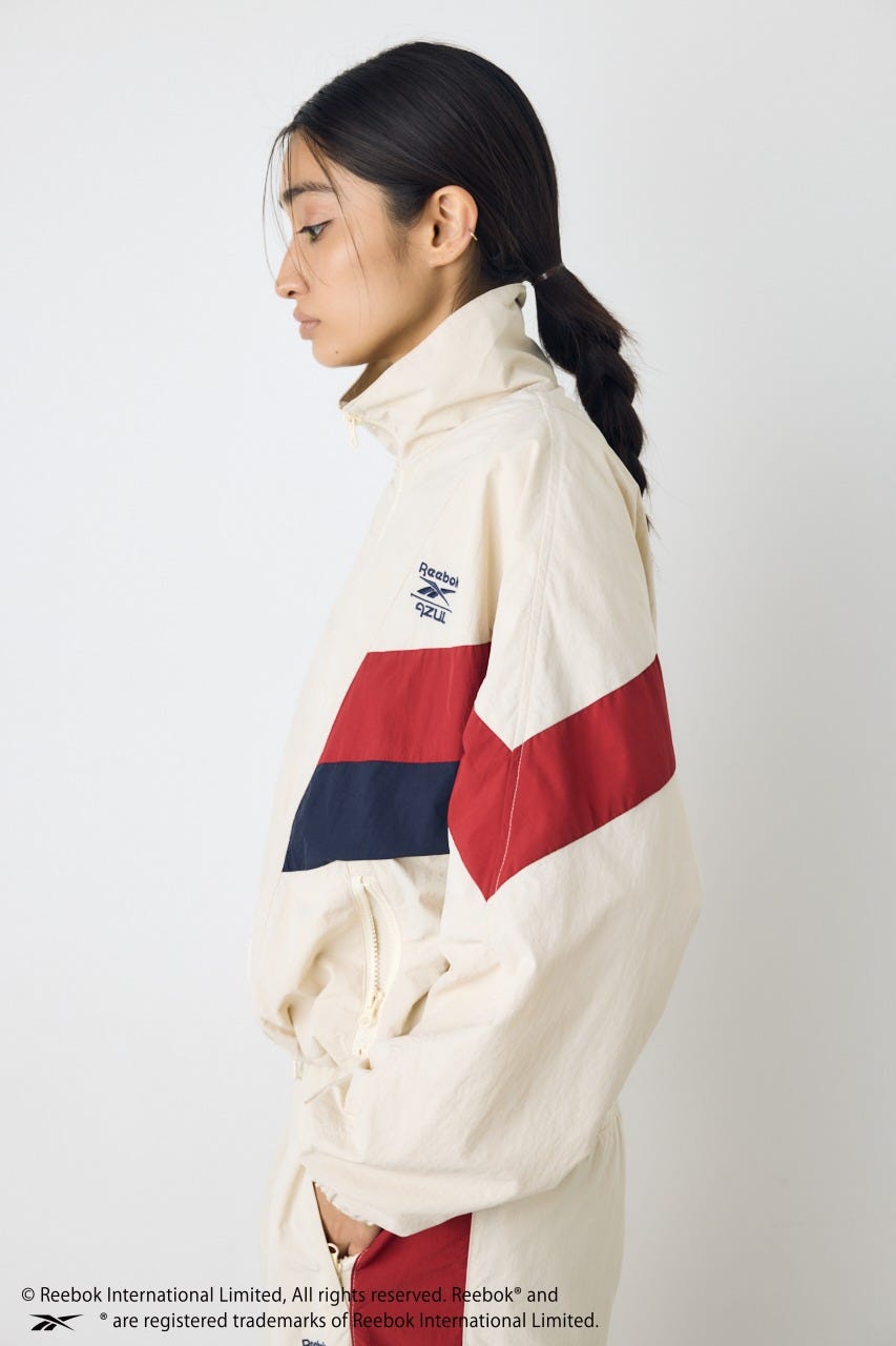 【REEBOK×AZUL】ナイロントラックジャケット IVOY M