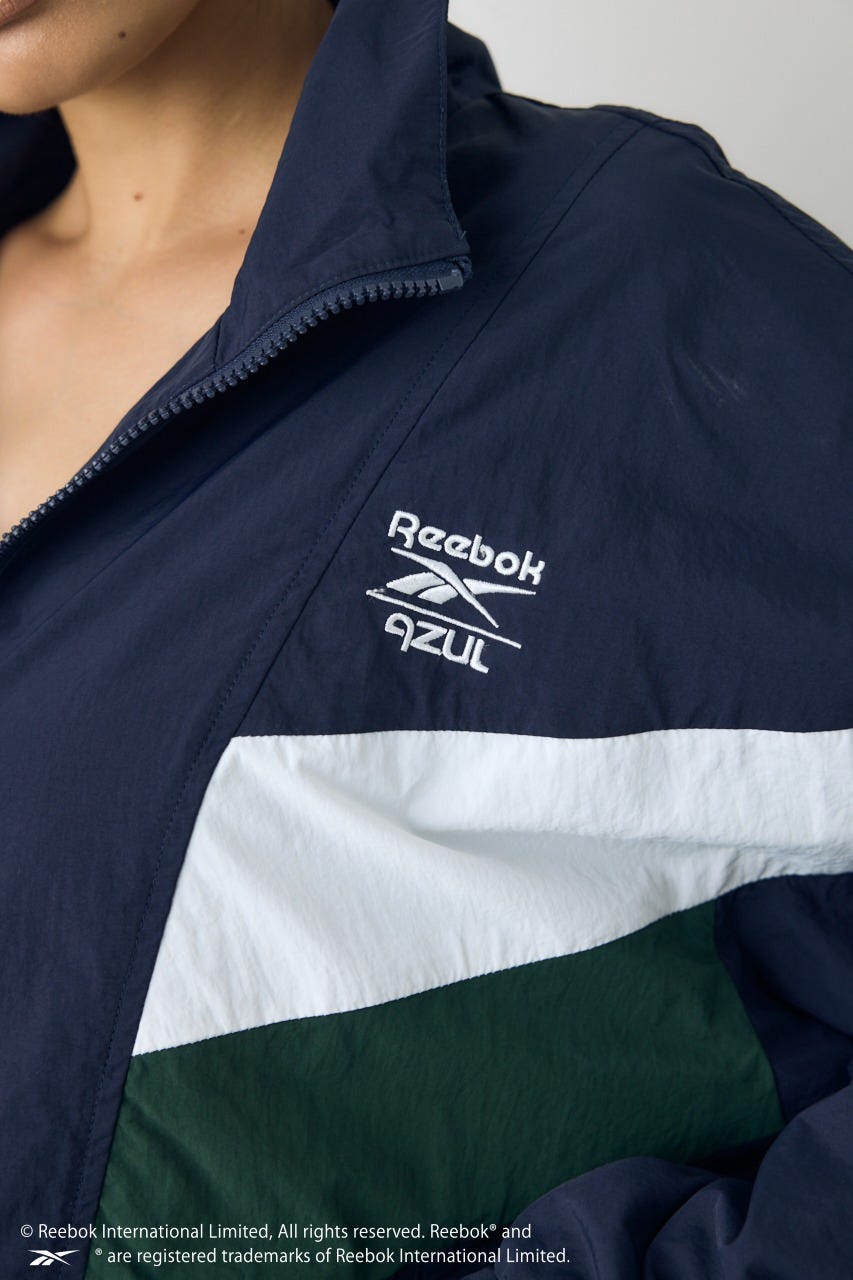 【REEBOK×AZUL】ナイロントラックジャケット NVY L
