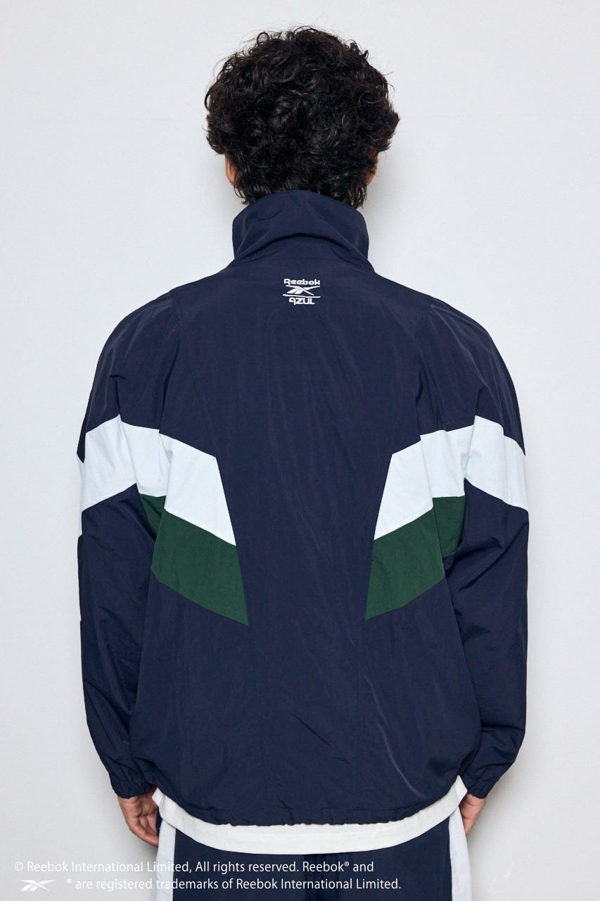 【REEBOK×AZUL】ナイロントラックジャケット NVY L