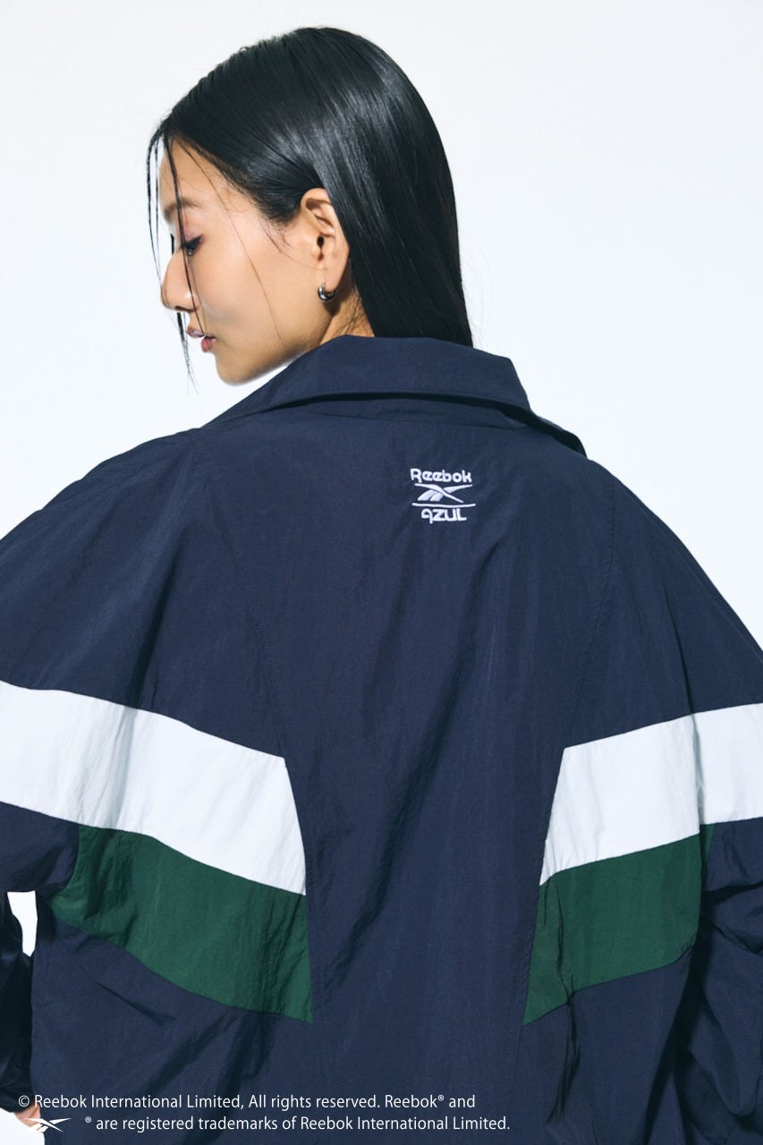 【REEBOK×AZUL】ナイロントラックジャケット NVY L