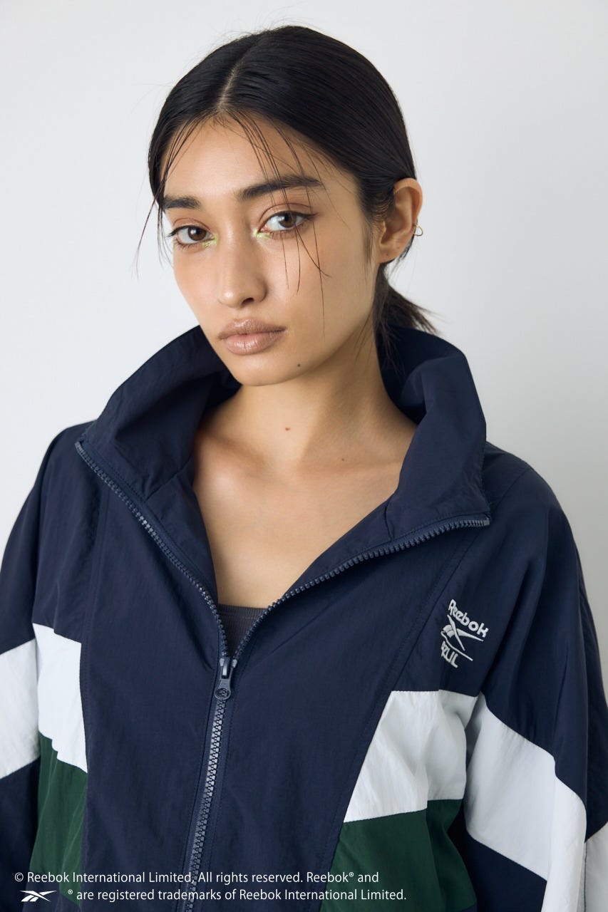 【REEBOK×AZUL】ナイロントラックジャケット NVY L