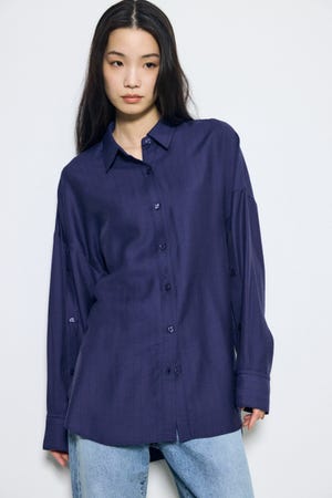 スリーブボタンストライプシャツ