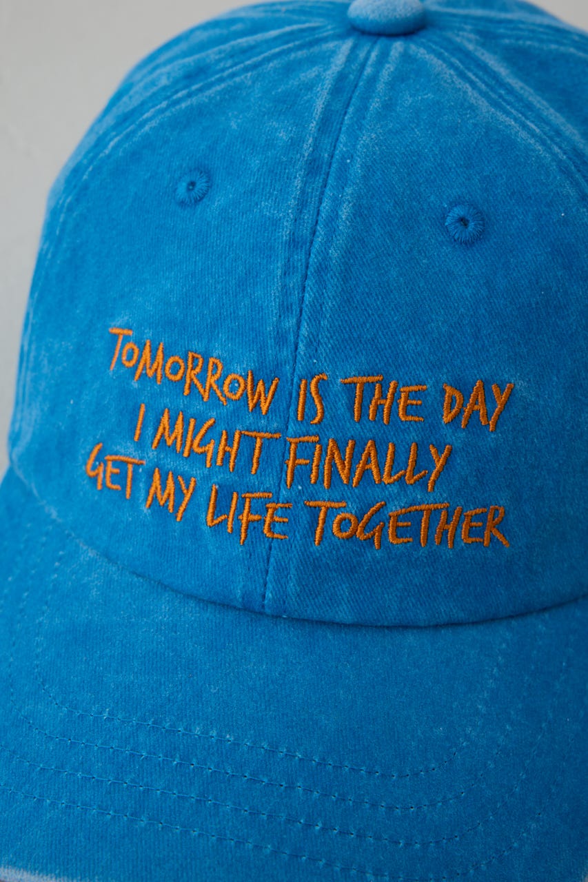 ウォッシュ加工フロントメッセージキャップ BLU FREE