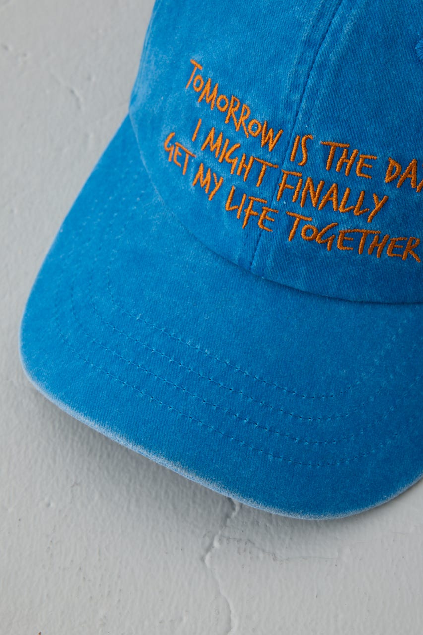 ウォッシュ加工フロントメッセージキャップ BLU FREE