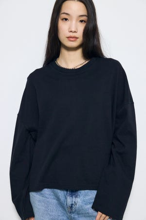 スリットヘムルーズプルオーバー