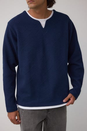 ジオメトリック柄トップス