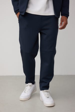 ダブルニットスリムパンツ