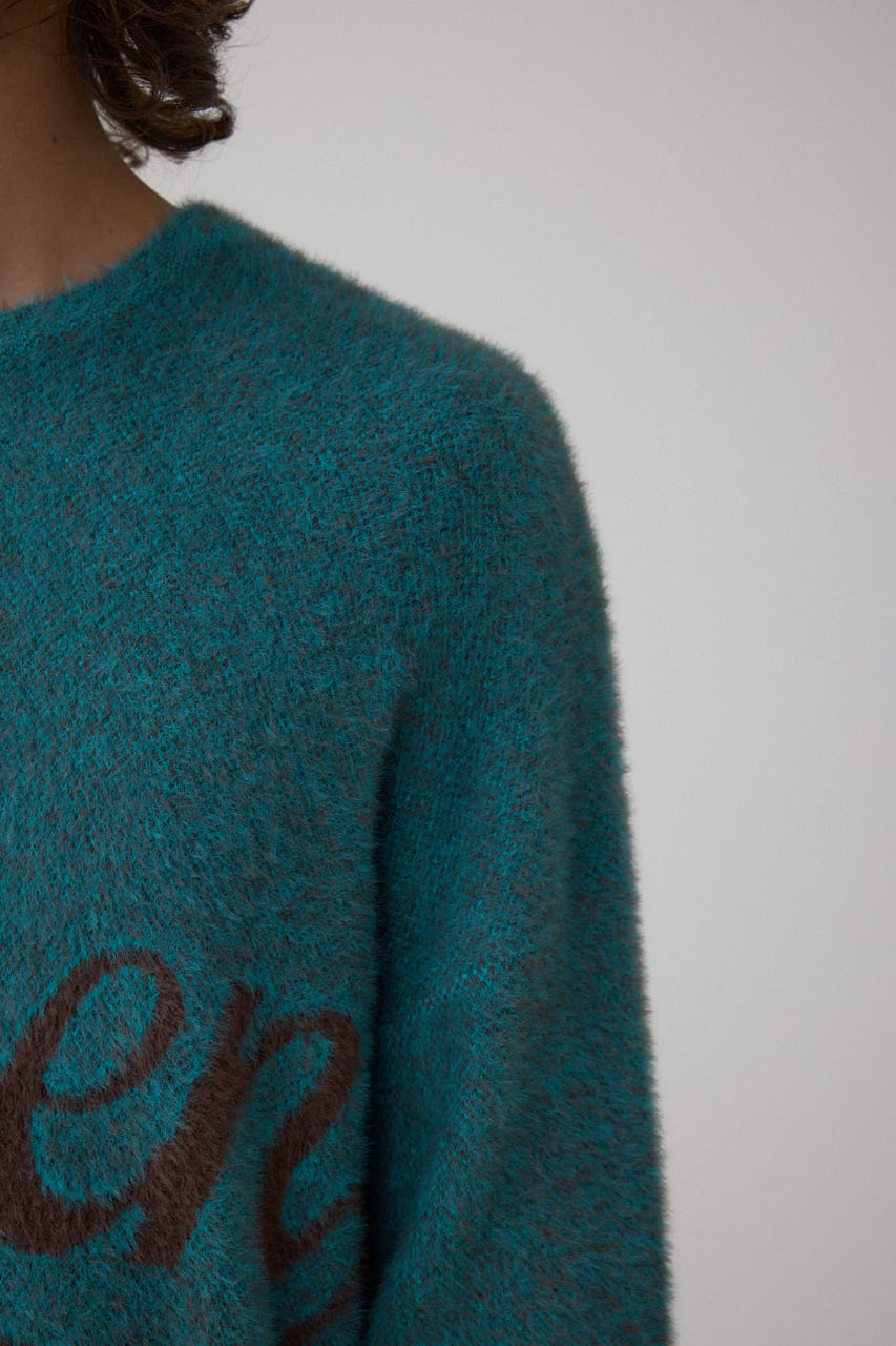 シャギーロゴニット 柄BLU FREE