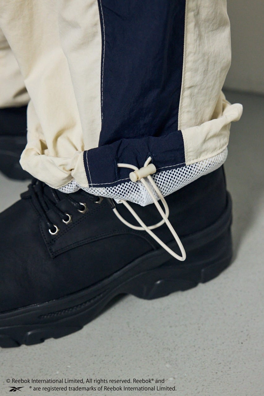 【REEBOK×AZUL】トラックパンツ IVOY L