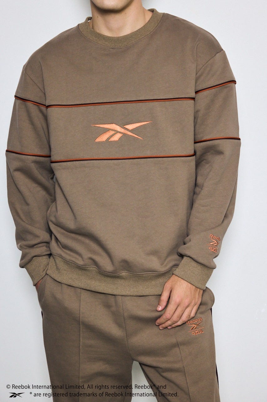 【REEBOK×AZUL】プルオーバー BRN FREE