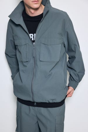 トライファンクションスタンドカラーブルゾン