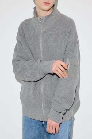 スタンドカラーWジップニット