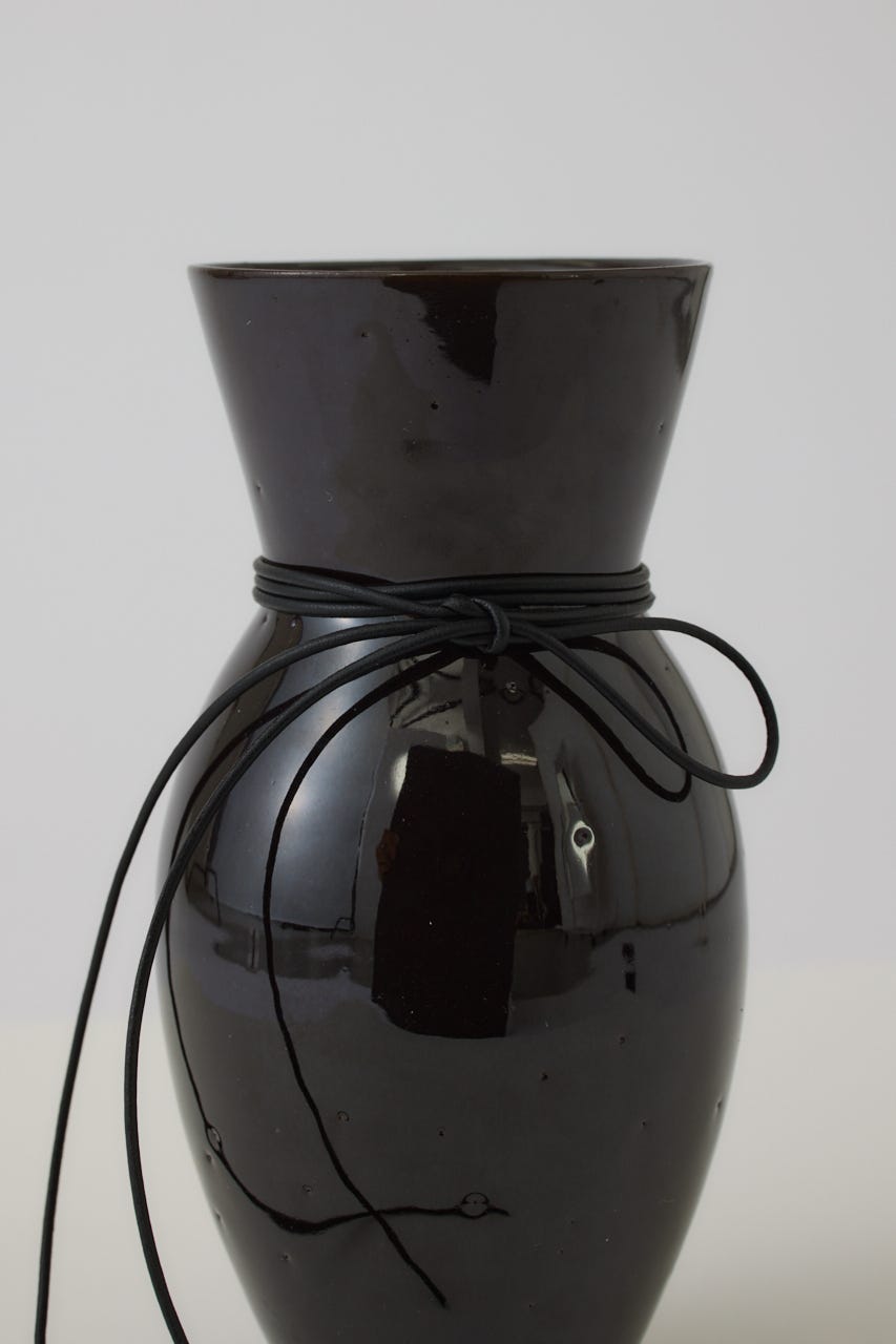 10/14- order start Silhouette Flower Vase D/BRN FREE