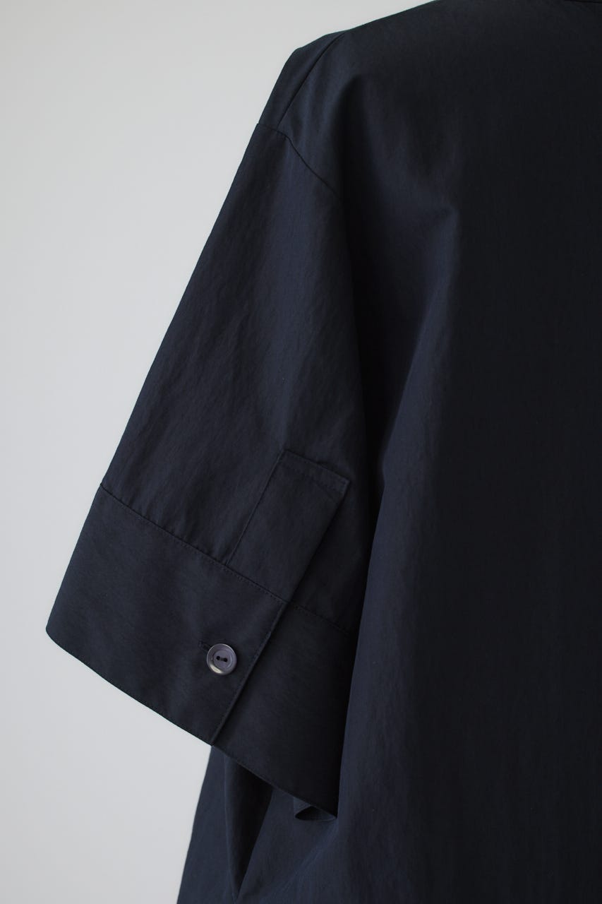 Asymmetric hem woven T/SH D/NVY FREE