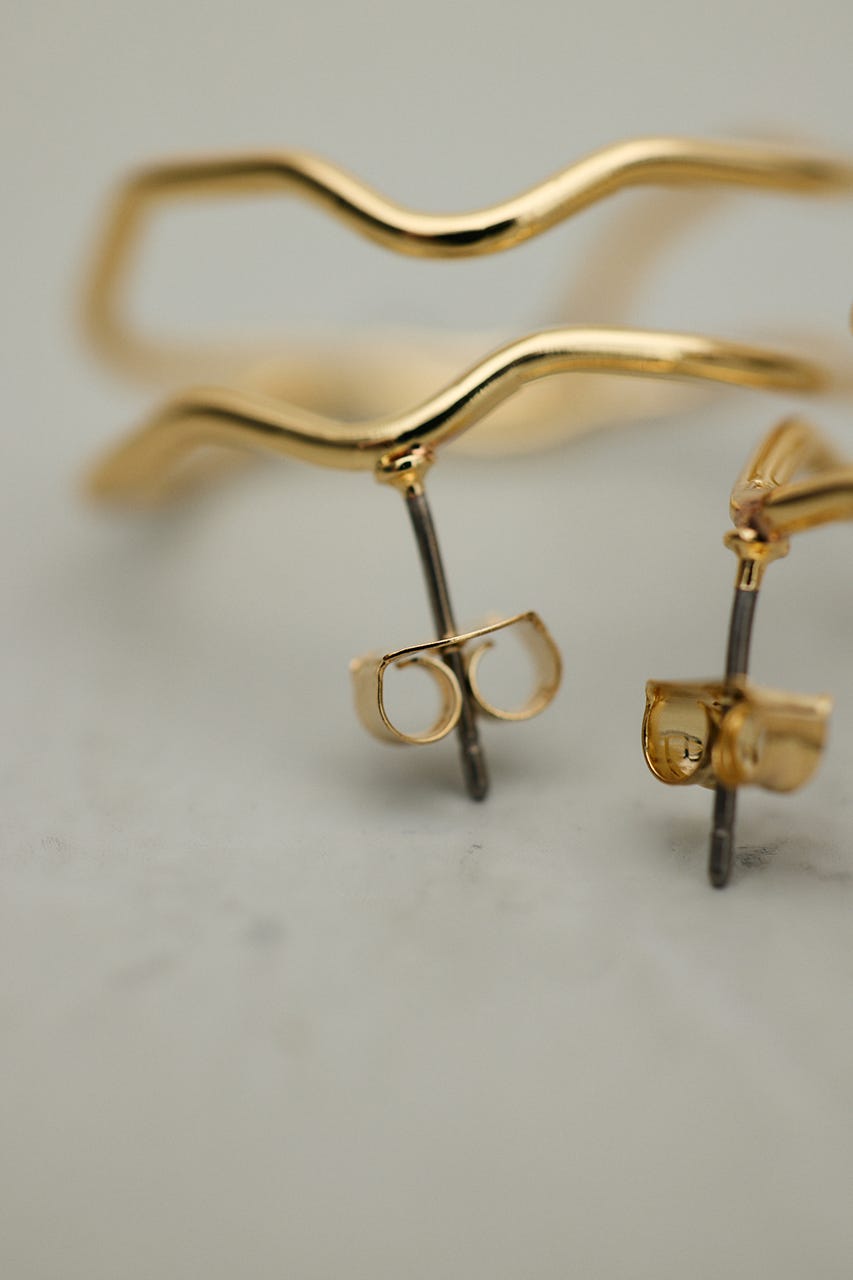 クロスウェーブピアス GLD FREE
