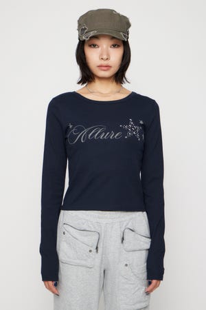 STAR MOTIF PRINT トップス