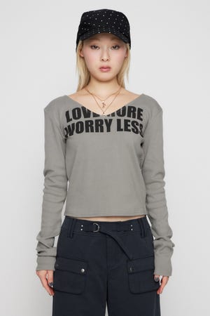 V NECK IMAPCT PRINT トップス